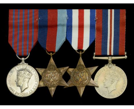 The Second War G.M. group of four awarded to Able Seaman M. H. Woods, Royal Navy, who served as a diver in ‘P’ Party 1571 dur