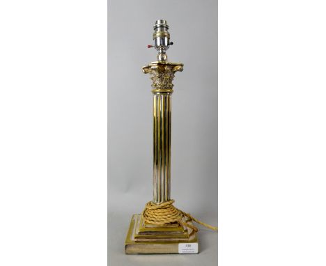 Silver plated lamp base in the form of a Corinthian column .   