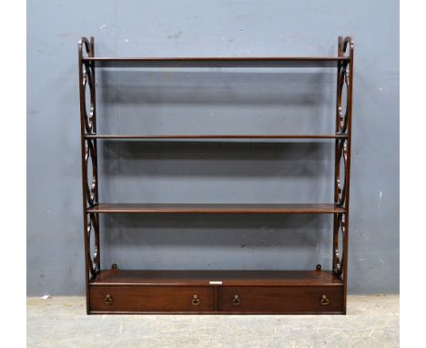 George III style mahogany wall hanging shelf with two drawers to base .   