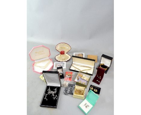 Mixed group of jewellery, woven necklace in yellow, white and rose gold, rose stud earrings, both in 9 ct, silver gilt cuff b
