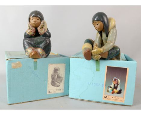 Lladro figuers  Esquimalita Cuidandose el pie No 2.157 and Esquimalita ensimis-mada2158 boxed .   
