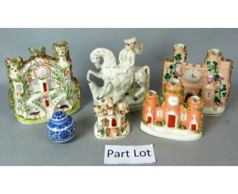 A quantity of Staffordshire flatback figures and pastel burners, mostly cottages, castles and clock tower buildings, and thre