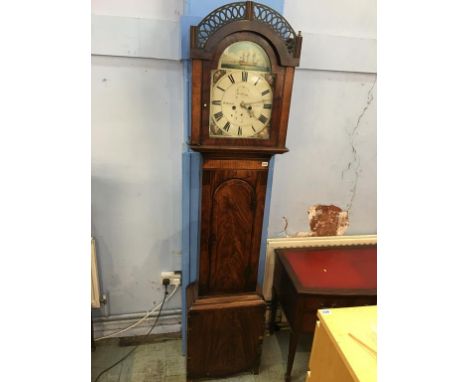 A 19th century mahogany long case clock by R. Mitchell of Sunderland, with eight day movement, painted dial, two subsidiary d