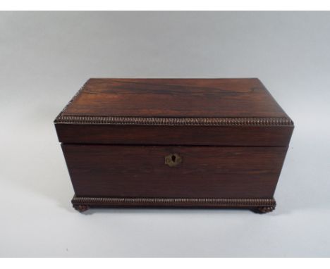 A Mid 19th Century Rosewood Two Division Tea Caddy with Centre Glass Mixing Bowl. Gadrooned Border and Bun Feet. 32x17x17.5cm