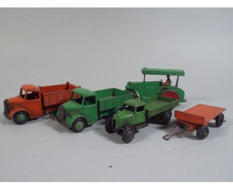 A Collection of Five Dinky Toys to include Bedford Tipper with Screw Lift, Bedford Tipper Green, Flatbed Lorry, Flatbed Trail