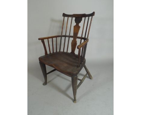 An Early Elm Seated Spindle Back Windsor Armchair with Vase Splat and Turned Splayed Supports. 