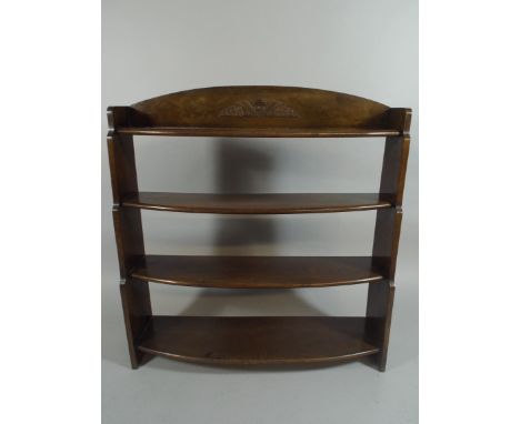 An Edwardian Oak Bow Fronted Waterfall Four Shelf Bookcase