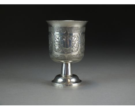 A Chinese silver stem cup, circa 1870, unrecorded maker MK, the bell-shaped bowl chased with flower panels above a taperin st