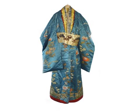 A theatrical Japanese style kimono, Cripps Sons & Co., Liverpool (label inside), early 20th Century, in pale blue silk with p