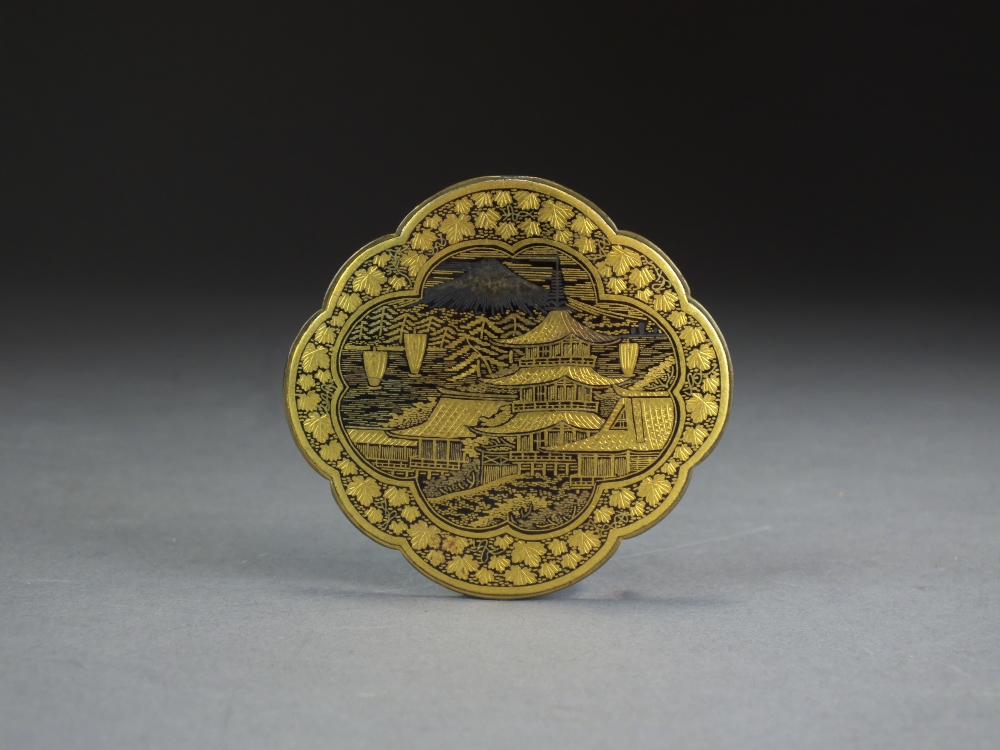 A Japanese Shakudo buckle, Taisho period, of lobed ovoid shape, inlaid ...