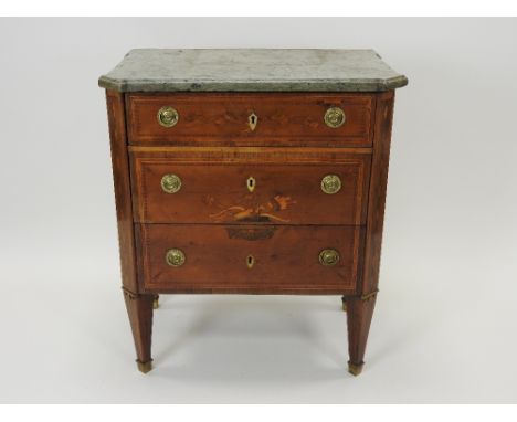 A 19th century Empire style marble topped commode, the three drawers fitted with brass ring handles and marquetry decorated b
