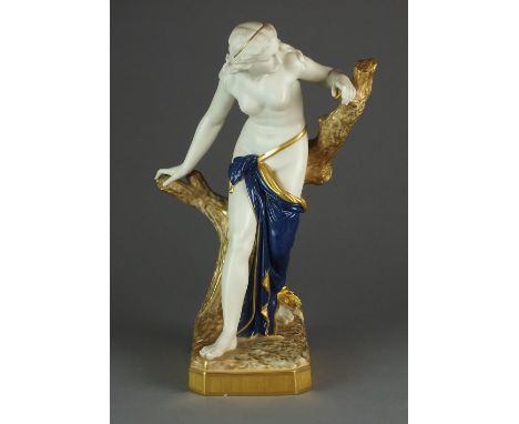 A Royal Worcester figure of 'The Bather Surprised', gilded and with deep blue drapery, shape 486, dated 1921, 37.5cm high
