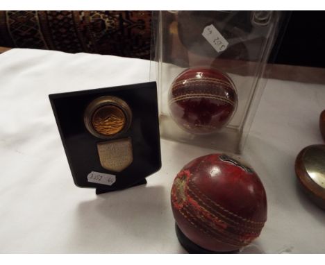 A match used Stuart Sturridge trophy cricket ball with white metal plaque engraved 'P. Wild 10 for 31 versus Pyrland Hall 196