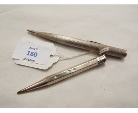 A sterling silver engine turned propelling pencil together with a silver 'Lady Yard'o'Lette' 