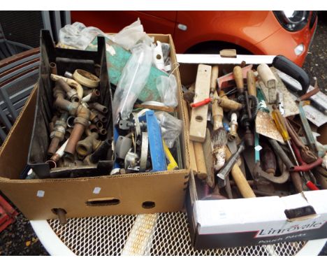 Two boxes of assorted tools, fixings, locks, copper piping etc