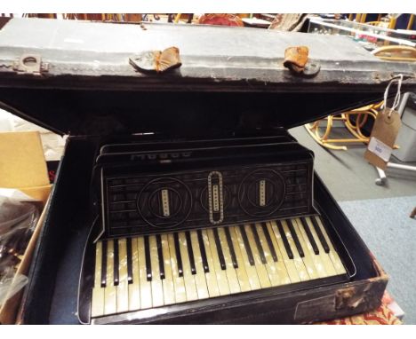 A cased Stanley Lewis of 66 Shaftesbury Avenue, Piccadilly W1, Casali Verona Italia accordion 