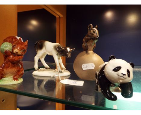 A Beswick panda cub, a Beswick 'Squirrel Nutkin', a Poole mouse and a Katzhutte figure of a calf