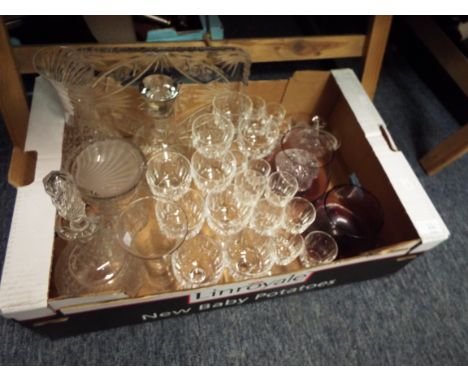 A part suite of wine and sherry glasses, two Caithness amethyst glass bowls, two decanters plus other crystal and glassware