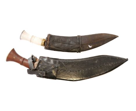 Two Kukri knives and scabbards, Two Kukri knives and scabbards, one stamped 'C ID44' to the ricasso, the other with bone grip