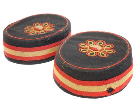 Two British army pill box caps Two British army pill box caps, retailed by Mallet Porter and Dowd London.18cm wide 