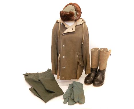 German WWII Winter Unform German WWII Winter Unform, to include a mouse grey to white reversible parka coat. Winter mittens w