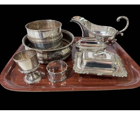 Silver napkin ring and egg cup set, EP sauce boat, butter dish and coasters, and Ronson table lighter (8).