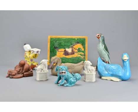 Nine Chinese Vintage Ceramic Items In Varying Animal Forms. Including kneeling boy. Parrot 22cm Tall (9)Provenance: Personal 