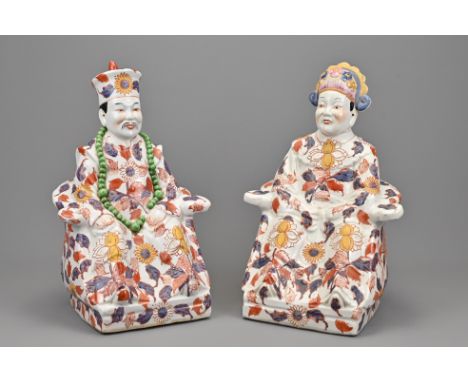 A pair of vintage Chinese ceramic Ancestral figures. The man and woman seated in horseshoe back armchairs. Six characters to 