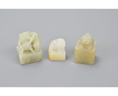 Three Chinese Jade Seals In Animal Form two carved with Chinese characters, one blank. Largest seal width 3.5 cm