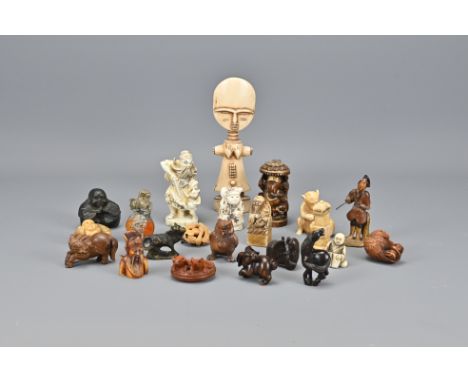 Twenty-Two Asian Carved Stone items Including netsuke and figural items. 4-17cm (22)Provenance: Personal collection of the la