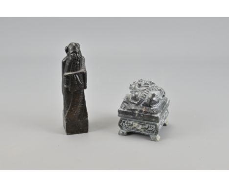 A Chinese Ink Stone With Cover together with a figurative soap stone seal. Seal height 16 cm (2)Provenance: Personal collecti