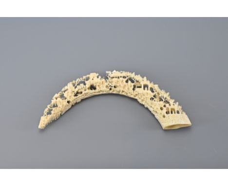 A 19/20th Century Chinese Carved Hippo Tusk Village Scene.   Please Note: all proceeds on this item go to the Guide Dogs For 