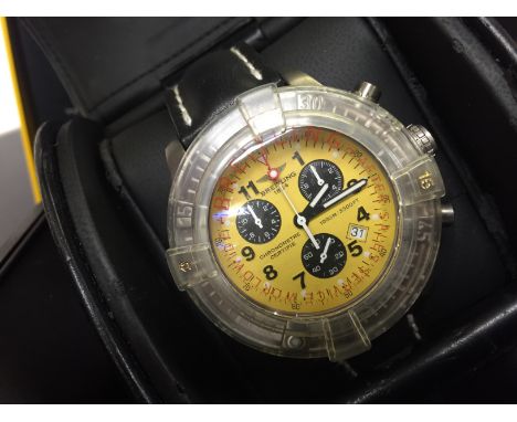 BRIETLING CHRONO AVENGER M1 GENTS WRIST WATCH QUARTZ MOVEMENT 44MM TITANIUM CASE WITH YELLOW ARABIC FACE COMPLETE WITH ALL BO