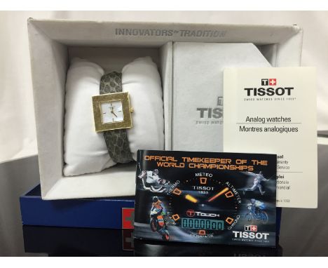 TISSOT DESIGNER LADY'S 18CT GOLD WRIST WATCH ON STYLISH DESIGNER STRAP, COMPLETE WITH BOXES AND INSTRUCTIONS 