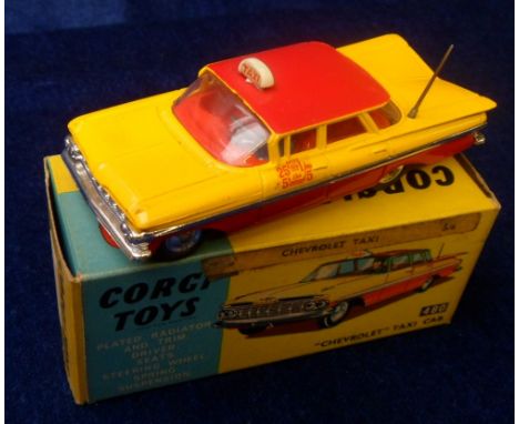 A Corgi Toys 480 Chevrolet Taxi Cab, yellow body, red roof and interior, spun hubs, driver, in original box with club leaflet