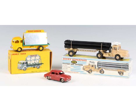 Three French Dinky Toys vehicles, comprising No. 33c Simca glazier's van, No. 893 Unic Sahara Tractor, both boxed, and No. 24