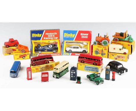 A group of Dinky Toys vehicles and accessories, including No. 281 luxury coach, No. 282 Duple Roadmaster coach, No. 342 motoc