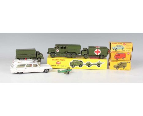 A small group of Dinky Toys vehicles, including No. 155 Ford Anglia, No. 260 Royal Mail van, No. 641 army 1-ton cargo truck a