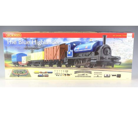 Three Hornby gauge OO goods train sets, comprising R.1157 West Coast Highlander, R.1127 City Industrial and R.1101 The Blue H
