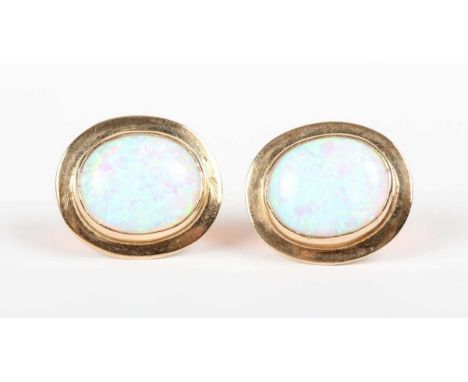 A pair of 9ct gold and synthetic opal oval earstuds, each collet set with an oval synthetic opal, with post and butterfly fit
