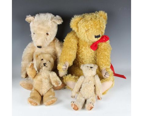 A Merrythought mohair growler teddy bear with amber and black eyes, vertically stitched snout, felt pads and jointed body, he