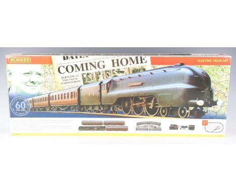A Hornby gauge OO R.1060 Coming Home train set, boxed, contents still tissue wrapped.