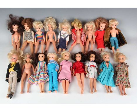 A collection of Sindy dolls in various costumes, together with a collection of other clothes and accessories and three Patch 