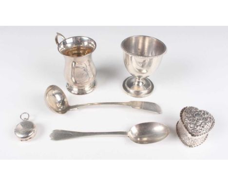 A Victorian silver heart shaped box, engraved with scrolls, London 1887 by William Comyns &amp; Sons, length 4.7cm, a Scottis