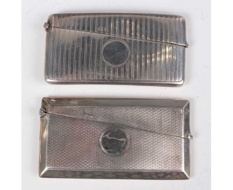 A George V silver carved rectangular card case with engine turned decoration, Birmingham 1912 by William Neale &amp; Son Ltd,