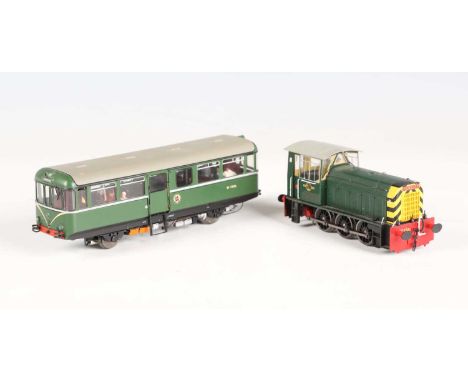 A Heljan gauge OO No. 88011 AC Cars railbus in BR light green with speed whiskers, and a No. 2502 Class 05 shunter in BR gree