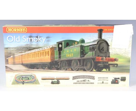Three Hornby gauge OO train sets, comprising R.1069 Old Smoky, R.1101 The Blue Highlander and R.1157 West Coast Highlander, a