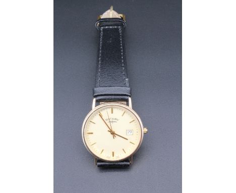 A Rotary 9 ct gold quartz wristwatch, having a circular champagne face with baton markers, conforming hands, centre sweep sec