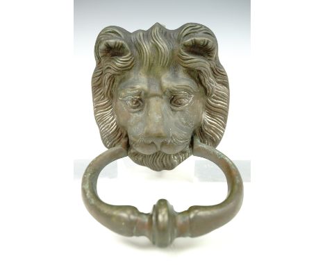 A brass lion's mask door knocker, late 20th century, 18.5 cm high