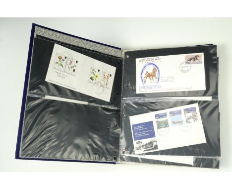 A sophisticated collection of British Caribbean islands mint definitive and commemorative QEII stamps, together with a small 